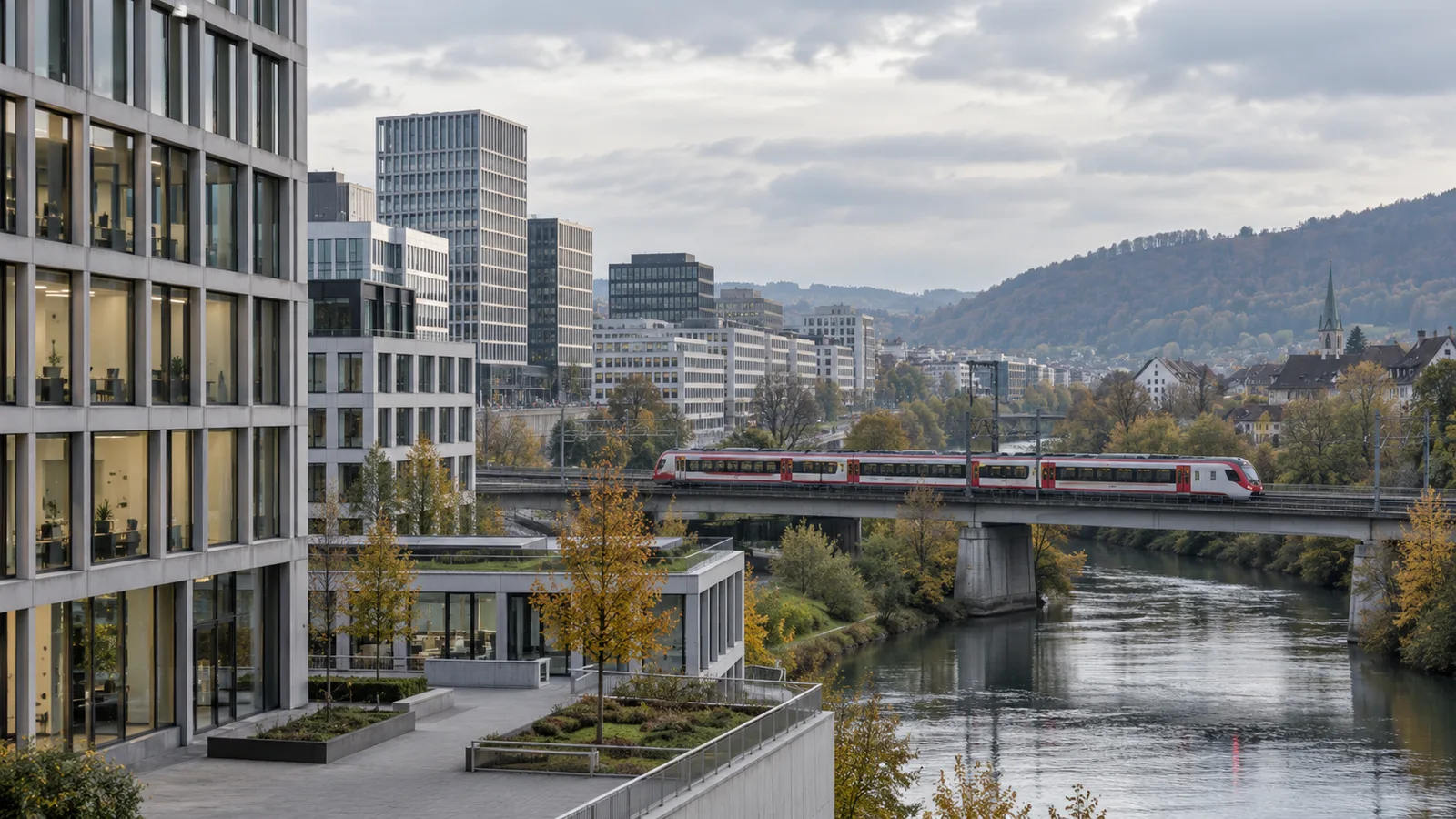 Symbolische Ansicht moderner Bürogebäude an einem Fluss mit vorbeifahrendem Zug.