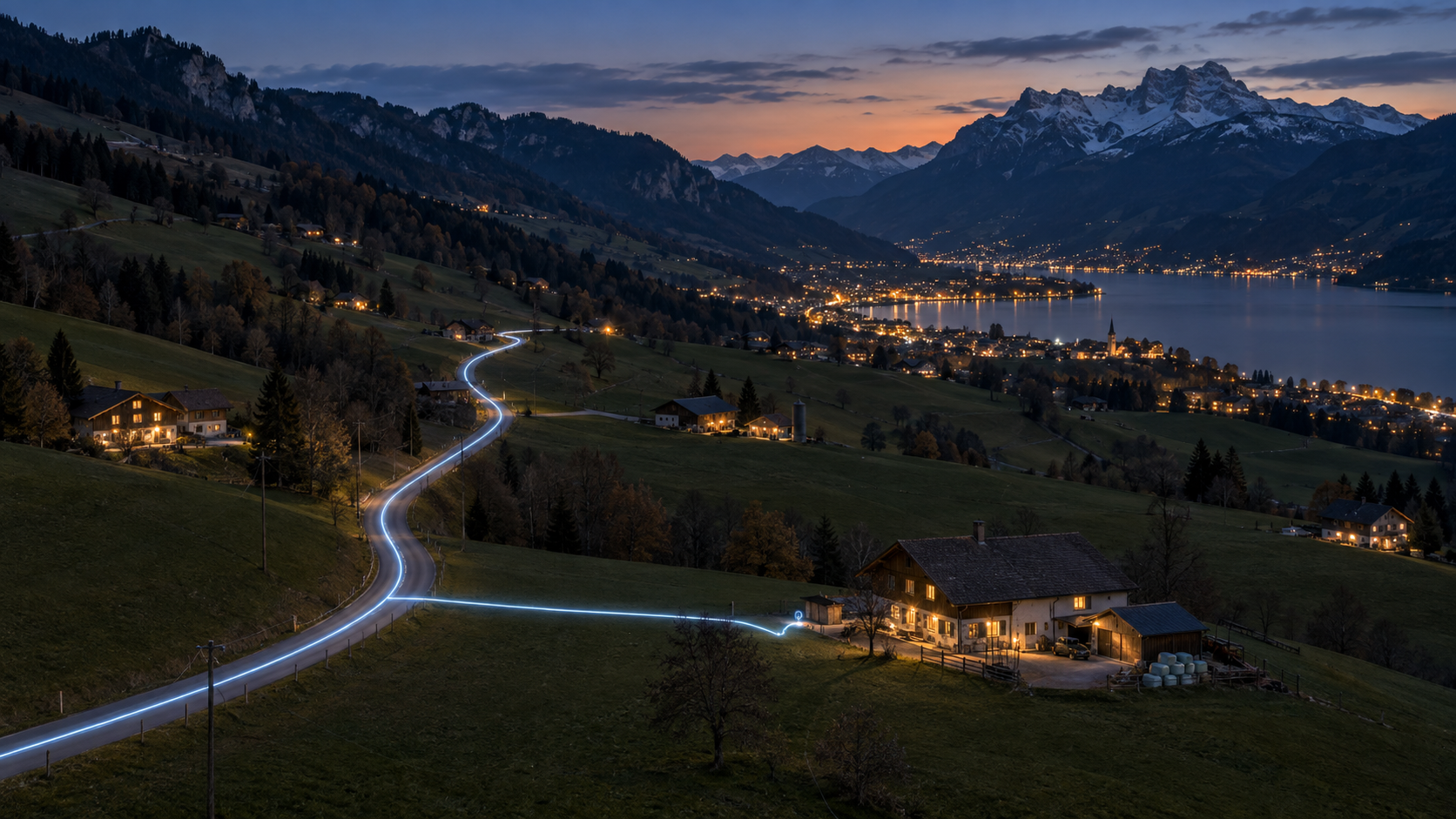Eine leuchtende Glasfaserlinie folgt einer Strasse zu einem abgelegenen Gebäude in einem Bergtal.
